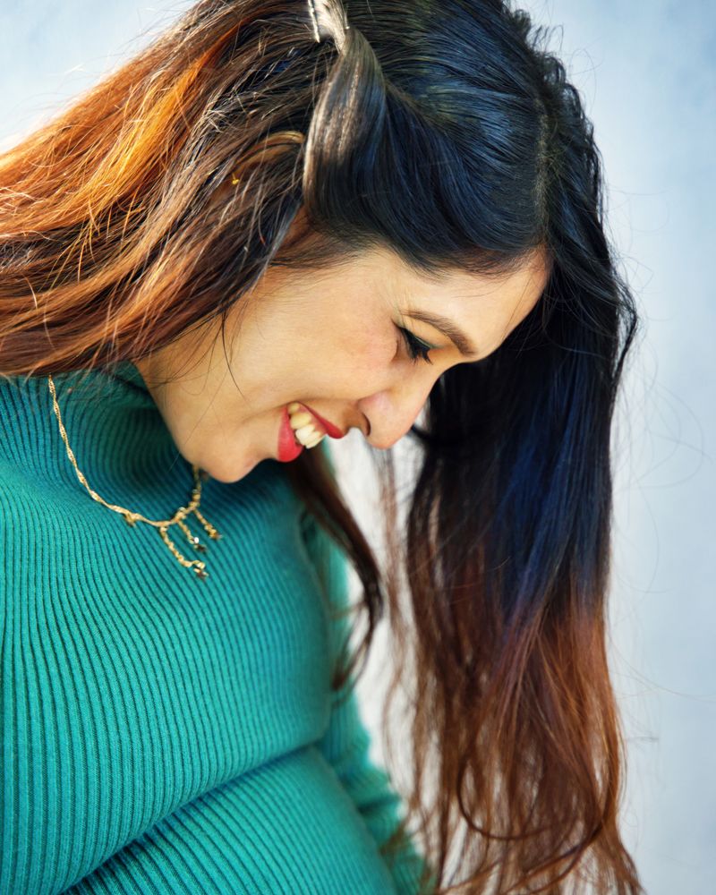 Smiling woman with long dark hair