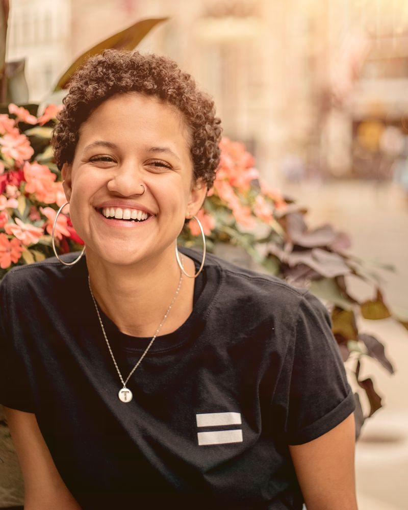 Smiling woman in a black T-shirt
