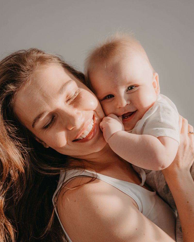 Mother holding her baby